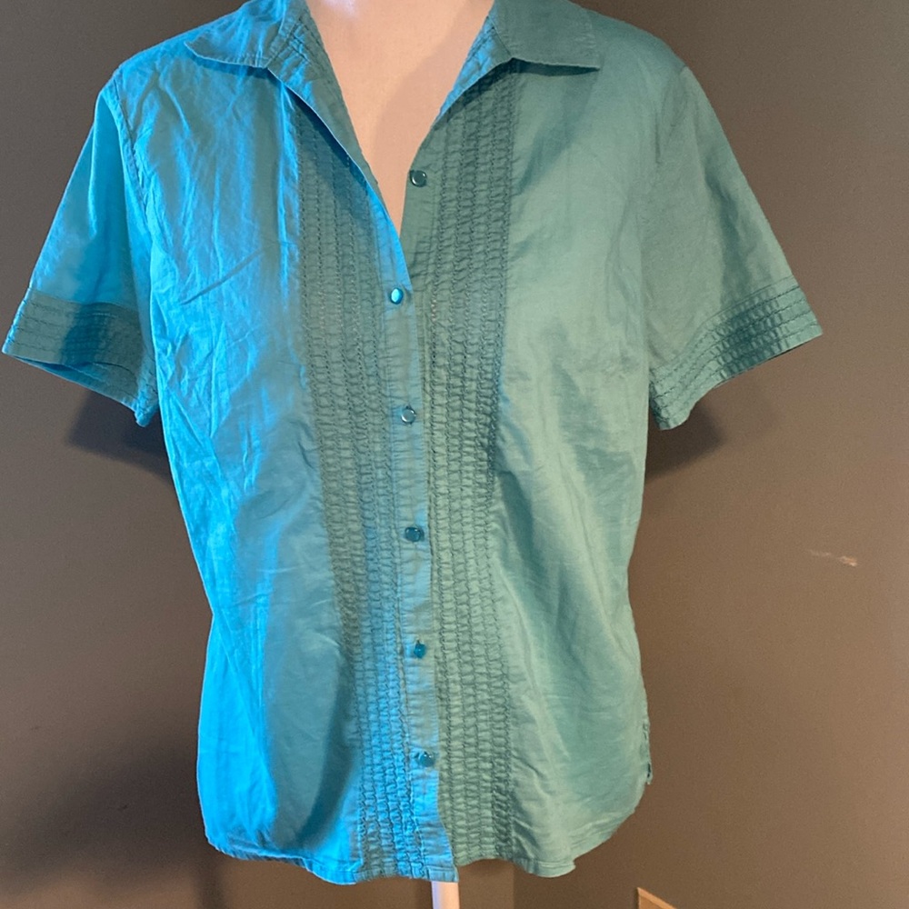 This turquoise!!! Love this top- just wish I was a small!!!